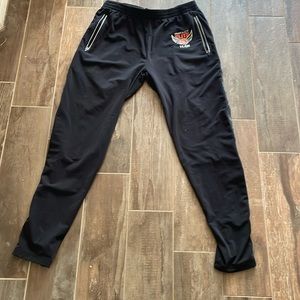 Snap up the side basketball pants. Size large. Impact elite